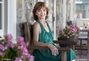 July 10, 2011 - Boonsboro, Maryland USA: Best-selling author Nora Roberts on the porch of the Inn at Boonsboro in historic Boonsboro, Maryland. Ms. Roberts bought the 1790s-era building and created an eight-room boutique hotel meant to cater to women's romantic sides. Rooms are named for famous literary couples, including Marguerite and Percy of "The Scarlet Pimpernel" and Jane and Rochester from "Jane Eyre." Ms. Roberts spent $3 million renovating the three-story inn. Roberts is the author of more than 209 romance novels. She writes as J.D. Robb for the "In Death" series (Evelyn Hockstein/POLARIS) ///